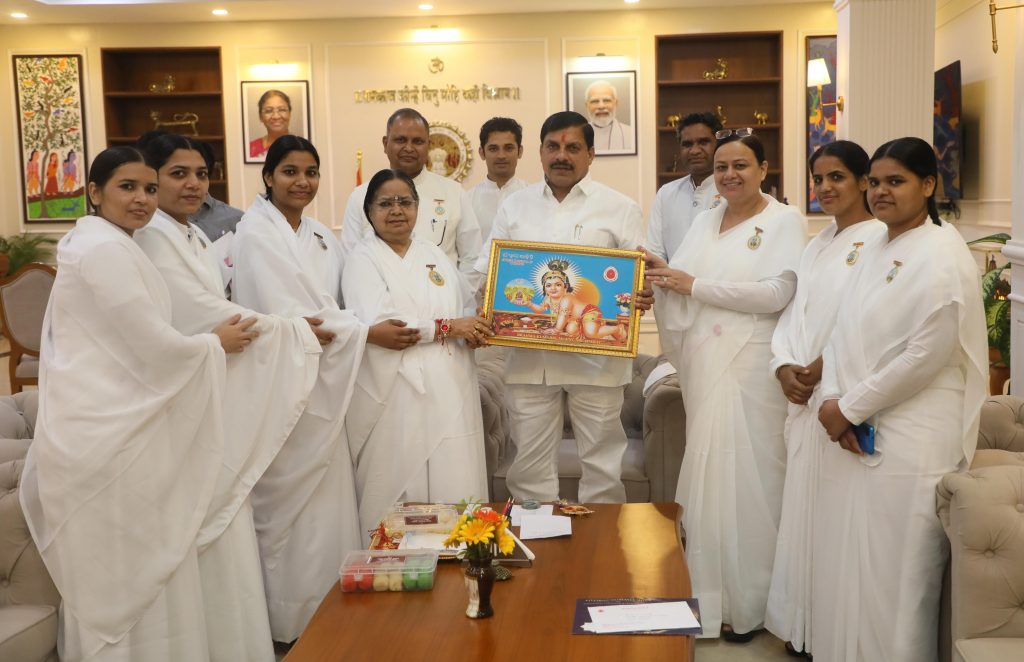 B. K. Avdhesh Didi tying Rakhi to Chief Minister of M.P., Dr. Mohan Yadav ji